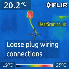 Thermal photo of a plug in a wall socket, showing overheating due to loose wiring connections